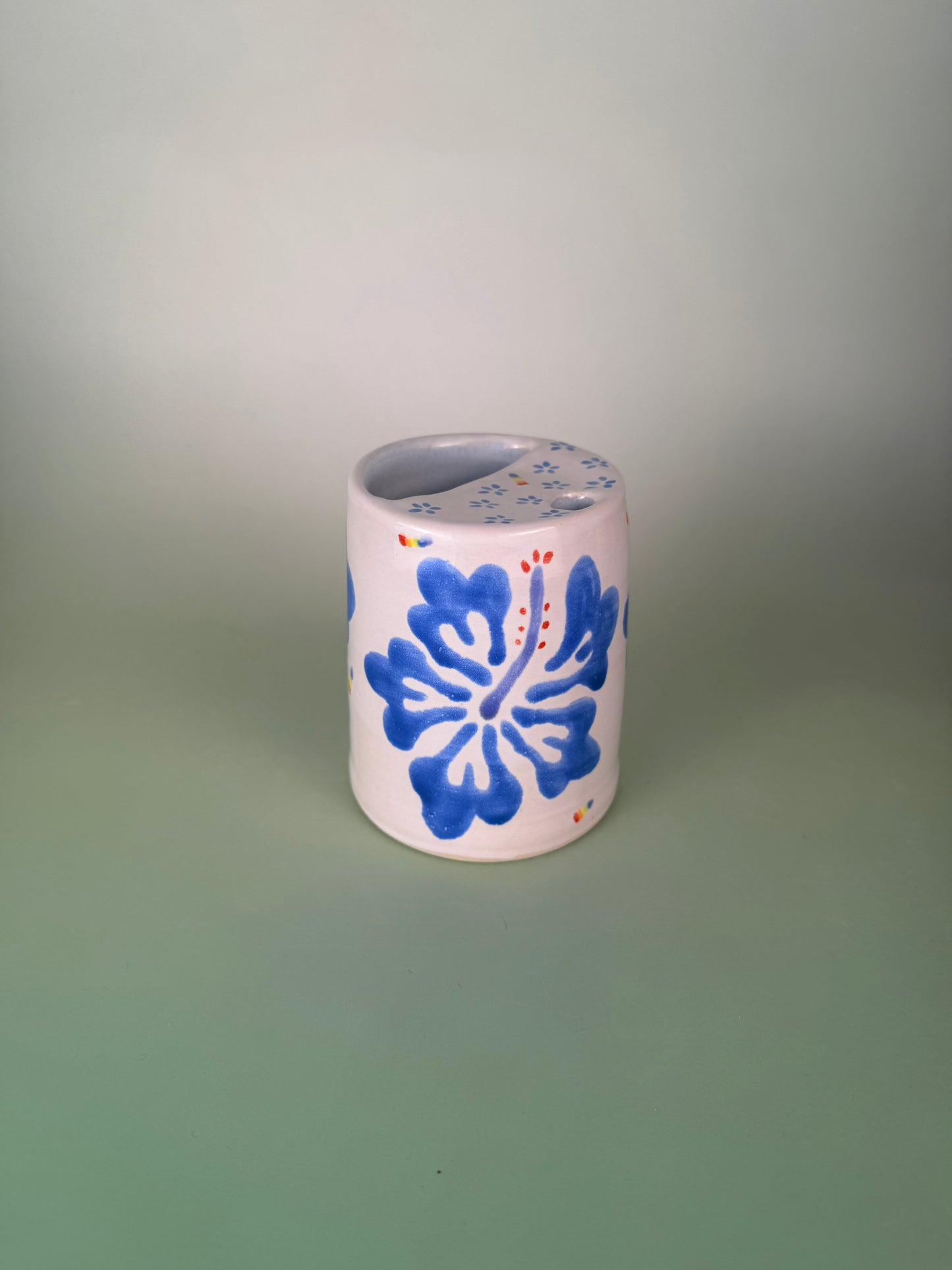 Rainbow blue hibiscus travel cup